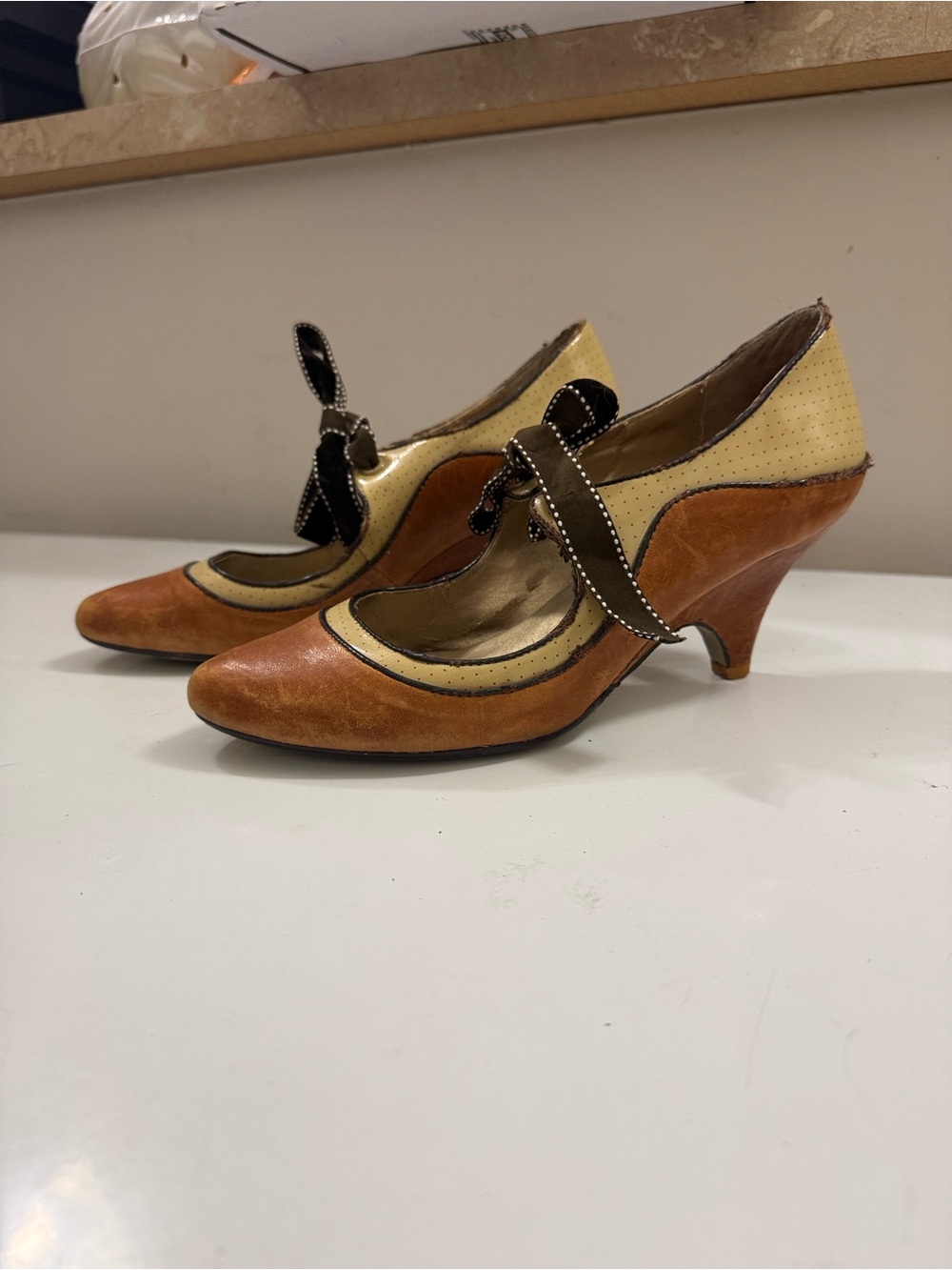 Poetic License Brown and Cream Mary Jane Heels with Bow Accent